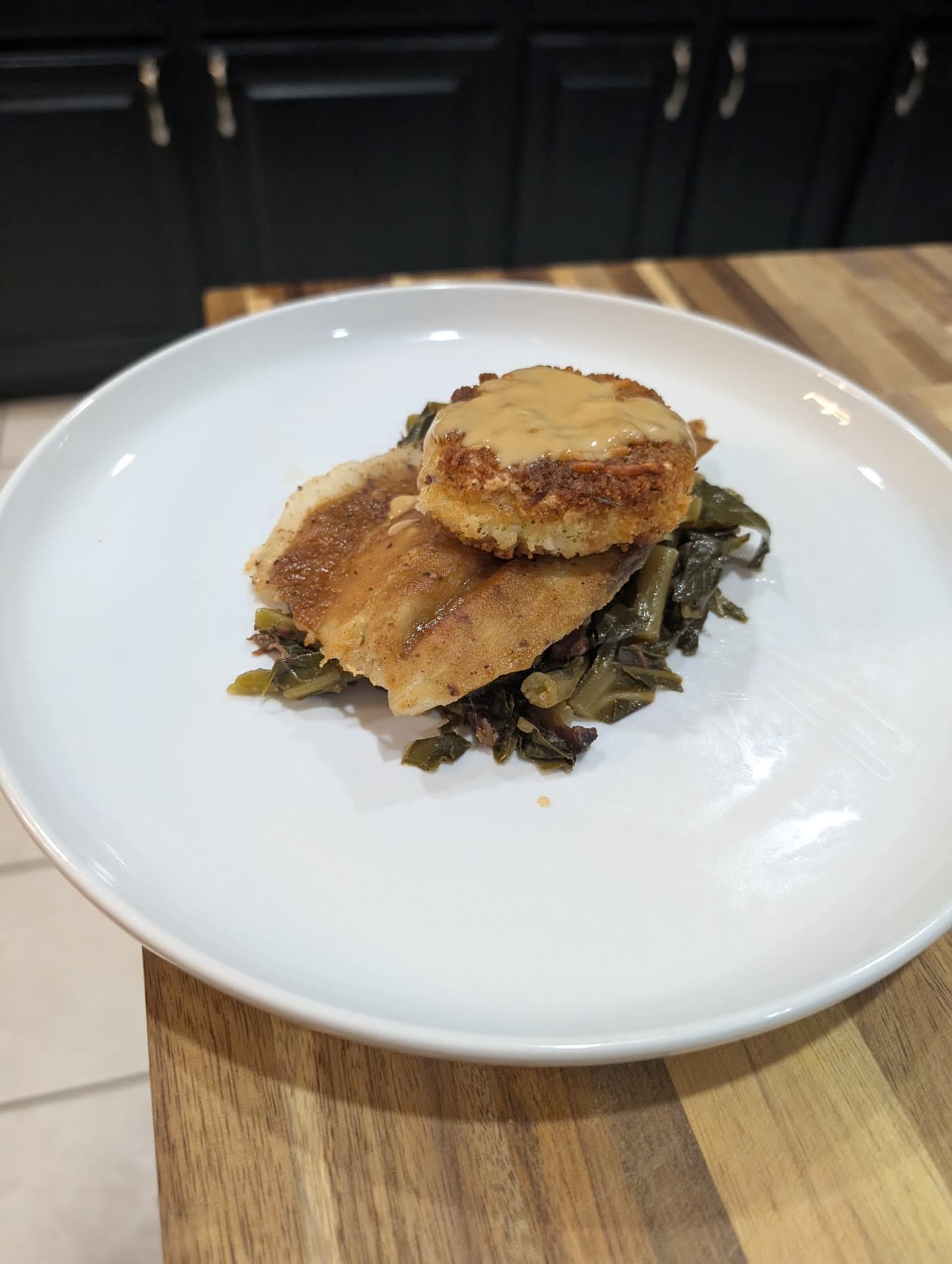 Smothered Fried Chicken over Collard Greens — photo 1