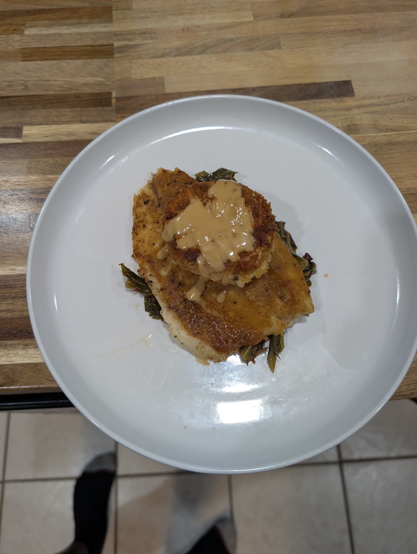 Smothered Fried Chicken over Collard Greens thumbnail 3